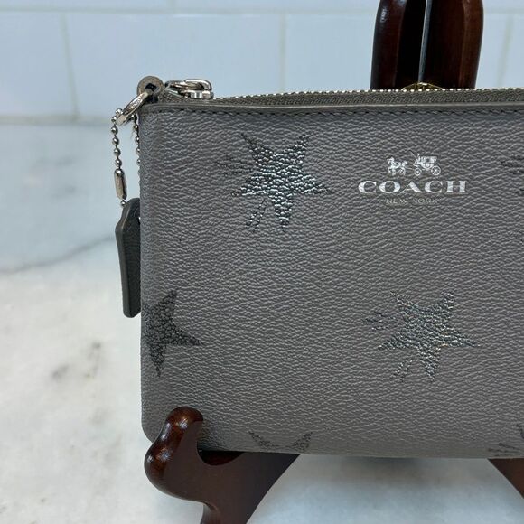 Coach Saffiano Leather Metallic Silver Star-Pattern Wristlet - Picture 2 of 16